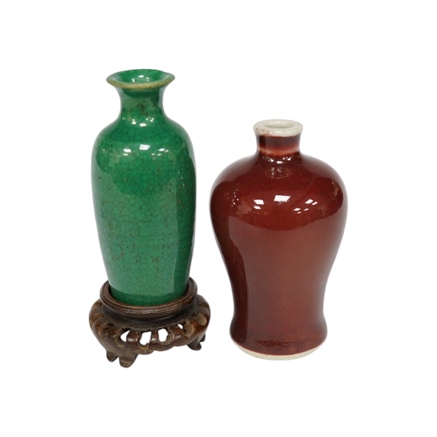 A Chinese miniature green glazed vase and a sang de boeuf snuff bottle, both 18th/19th century, largest 9cm high overall. Condition - green glazed example with chip to top rim
